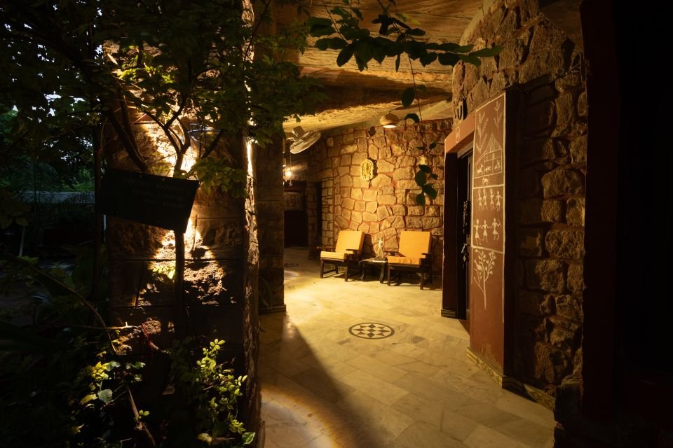 Garden path leading to the rooms Garden path lined with trees leading to the Garden Rooms at The Mandore, Jodhpur