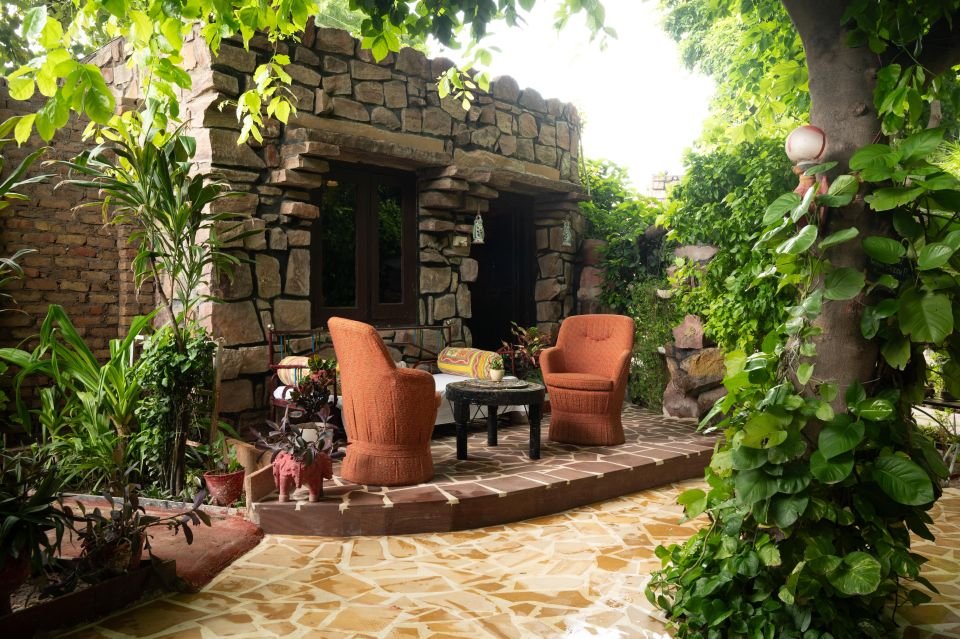 Garden sit-out outside the rooms Garden sit-out with armchairs outside the Garden Rooms at The Mandore, Jodhpur