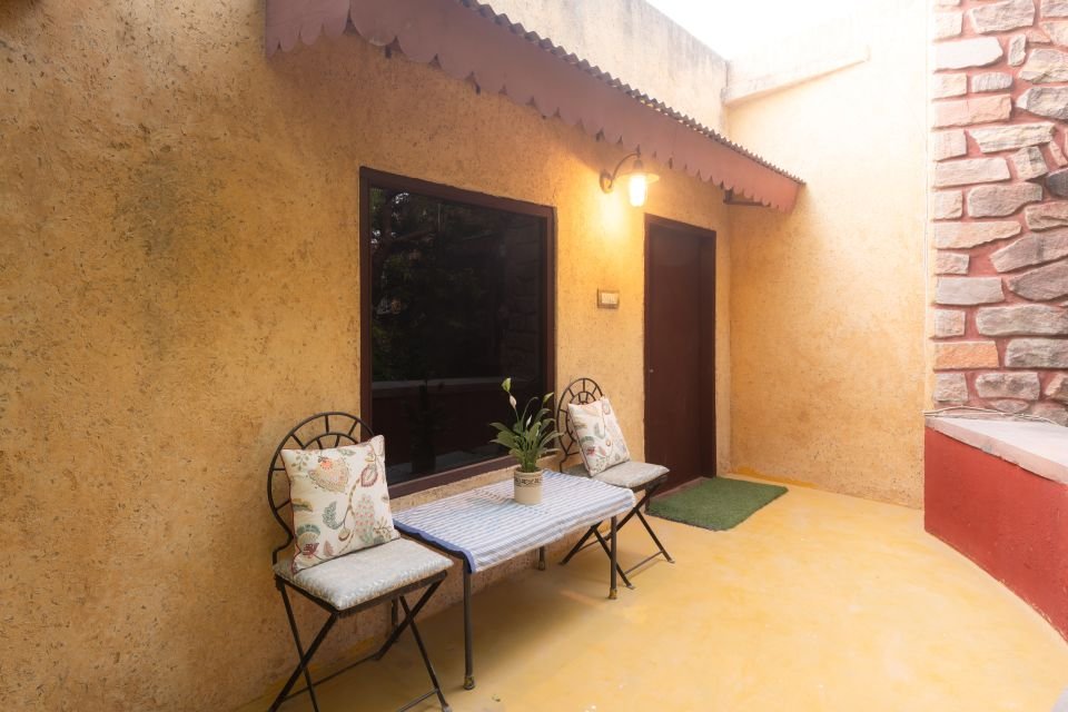 Private veranda with garden seating outside the Mandore Family Room, Jodhpur