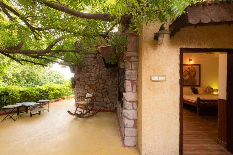 Private garden patio Private garden patio with rocking chair outside the Mandore Jacuzzi room, Jodhpur