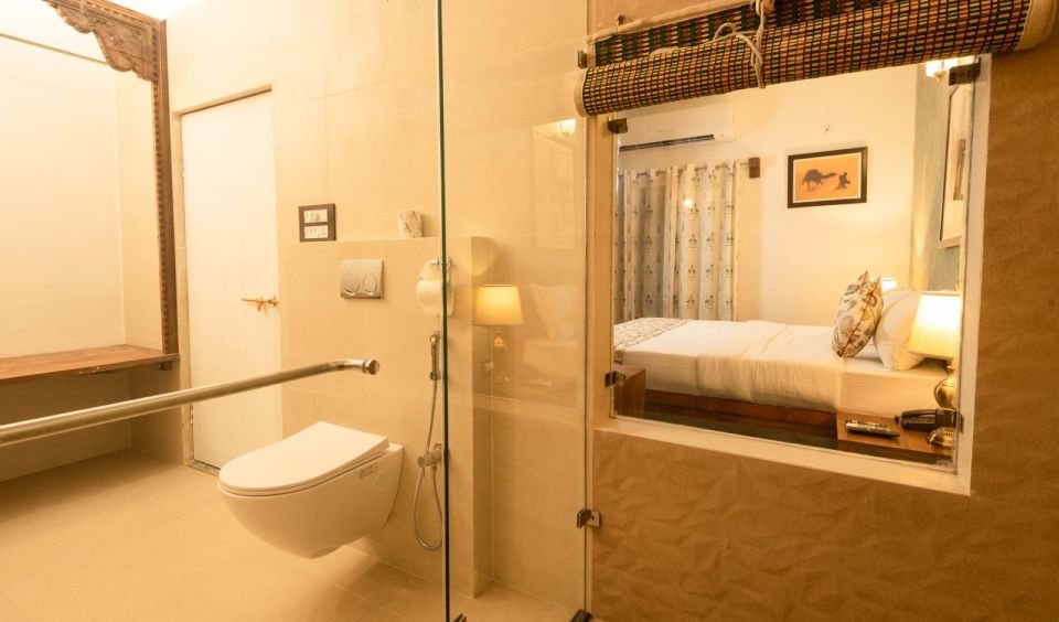 Glass-partitioned bathroom Mandore Premium glass-partitioned bathroom with rain shower at The Mandore, Jodhpur