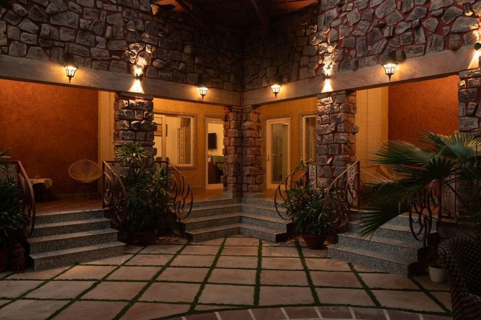 Courtyard in the evening Lantern-lit stone courtyard near the Mandore Suite, Jodhpur