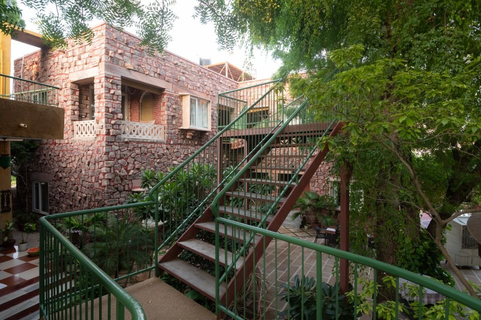 Garden stairway to the suites Garden stairway up to the Mandore Suite amid trees at The Mandore, Jodhpur
